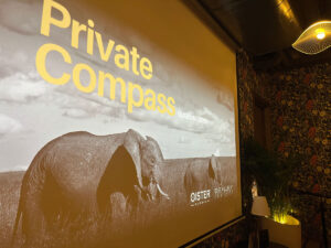 Private Compass Mumbai title slide with elephants, presented by Oister and Bexley Advisors.